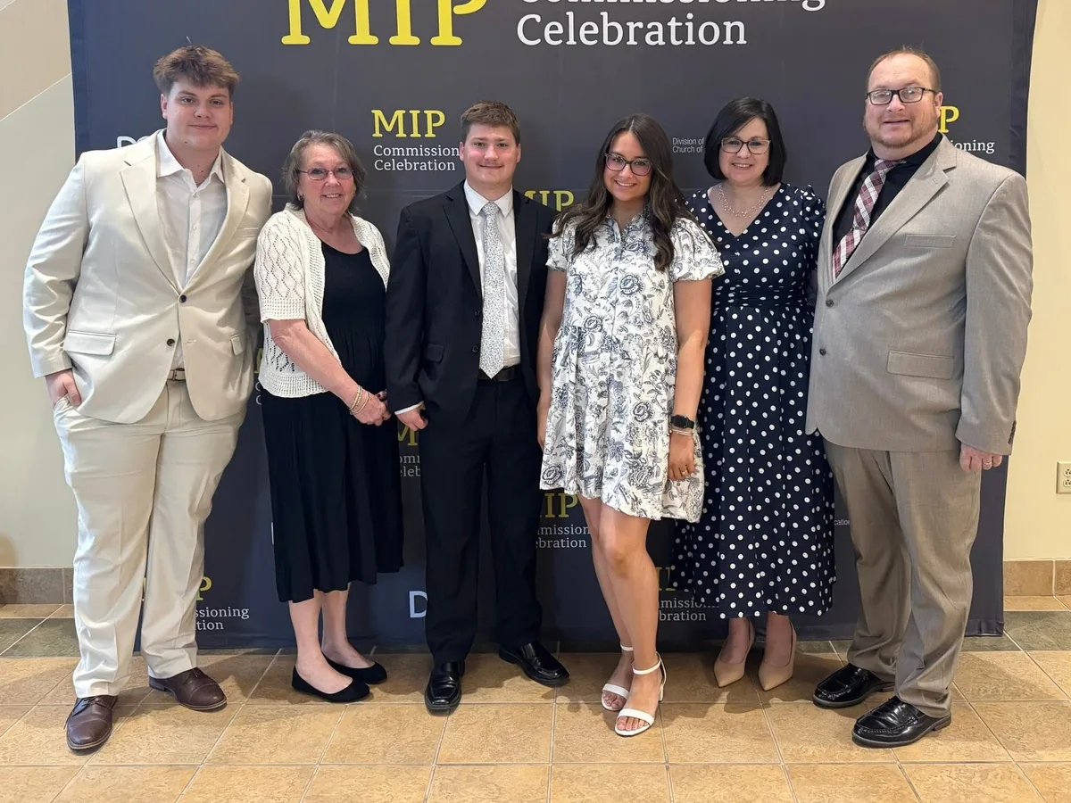 Pastor Larry Lewis and Julie Lewis with their family